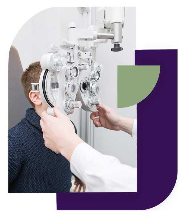 A young patient wearing an adjustable trial frame during a children’s sight test at Bath Opticians